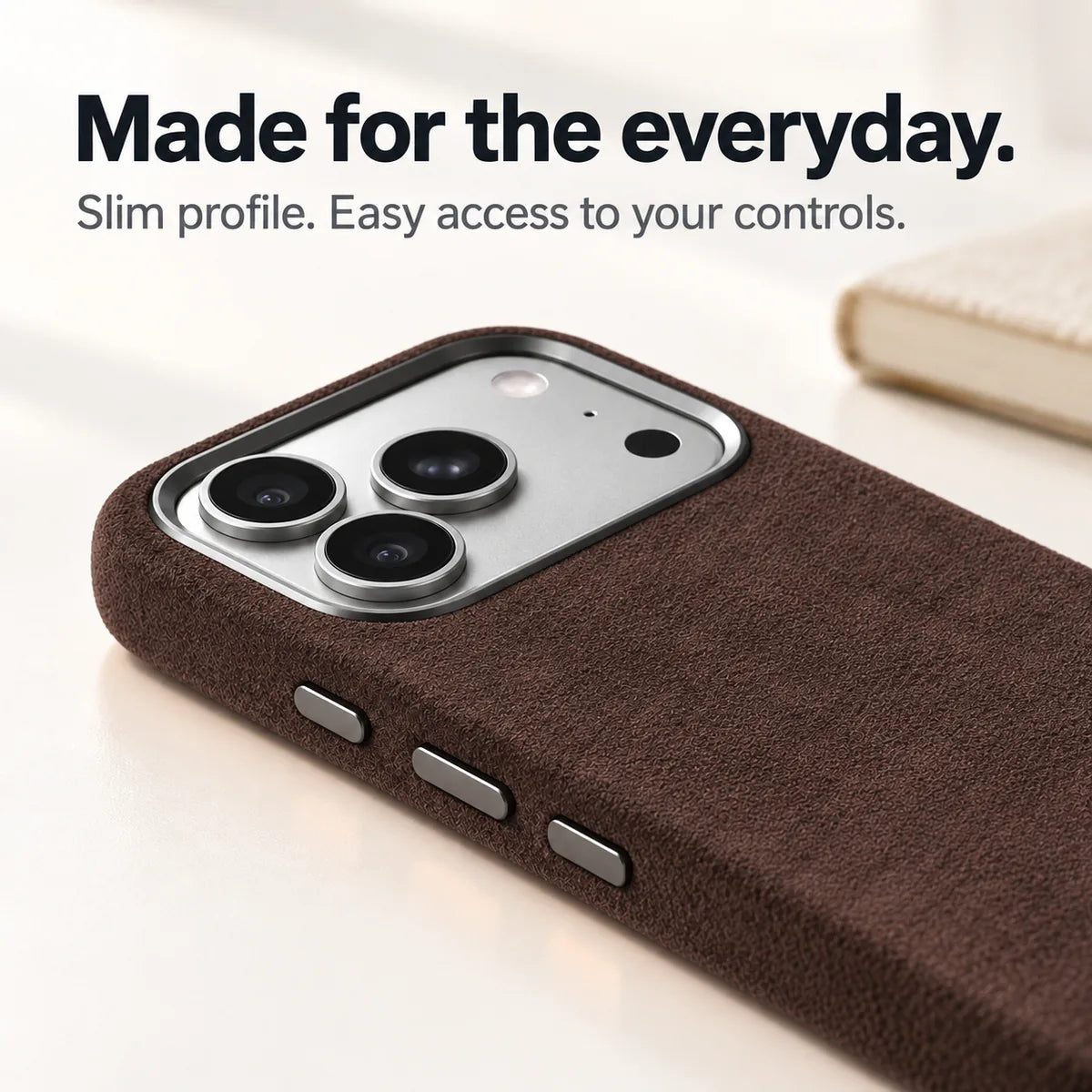 Brown fabric phone case with a close view of its slim side and controls. #color_Espresso Brown