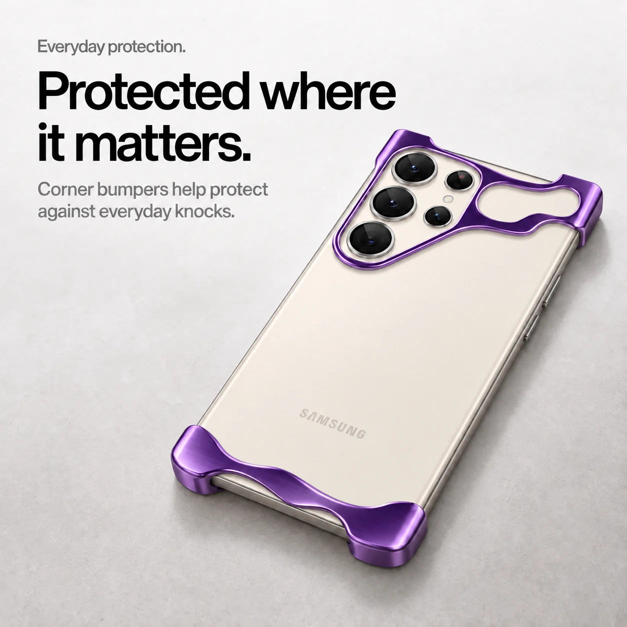 Purple open metal phone bumper case lying on a desk with raised corner protection #color_Purple